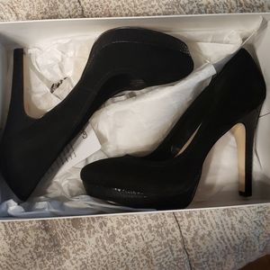 Black Calvin Klein pumps